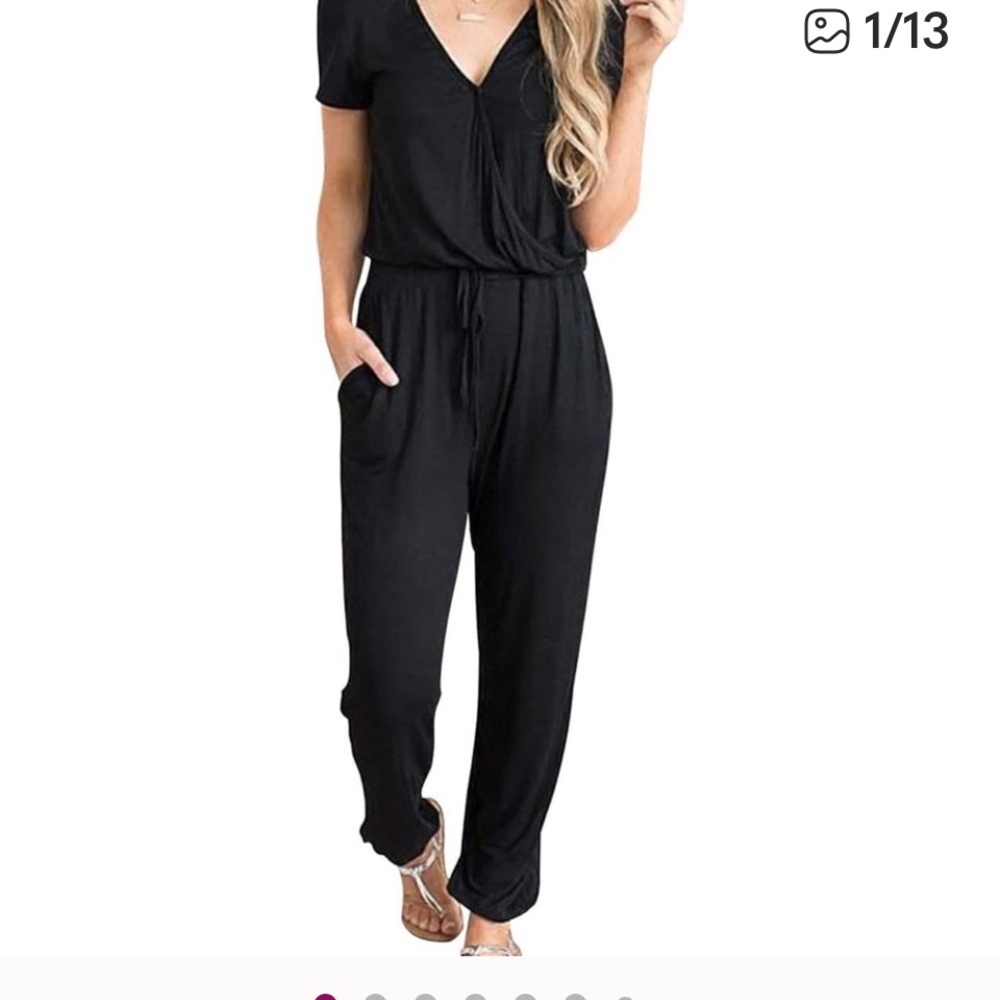 Full length Jumpsuit, fringe surplus top, tie waist.
Jogger style 
Sz L